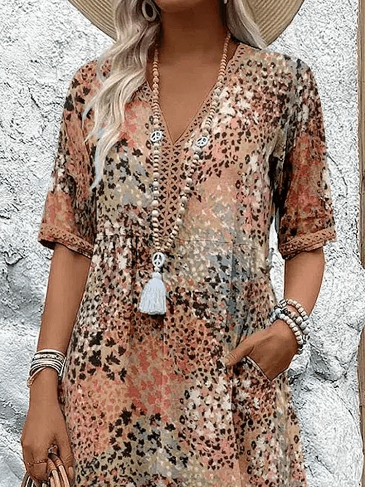 Skyler Ocean Breeze summer dress with a flowing silhouette, shown in vibrant colours