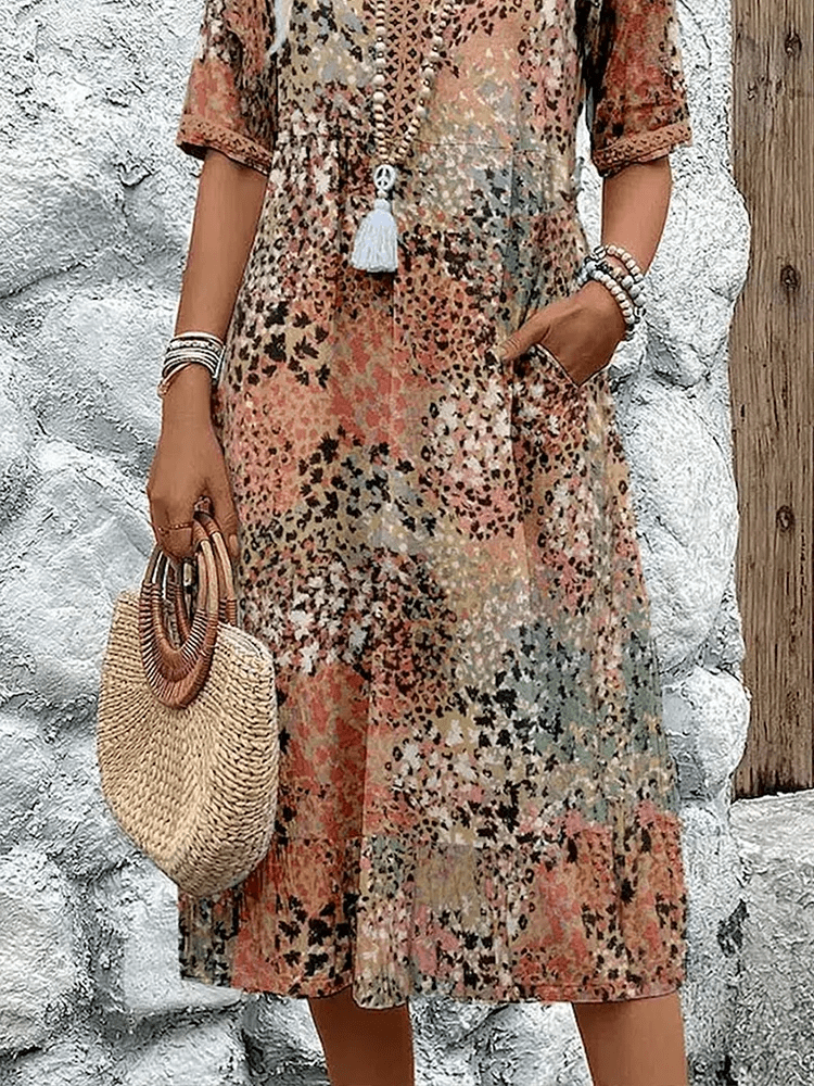 Skyler Ocean Breeze summer dress with a flowing silhouette, shown in vibrant colours