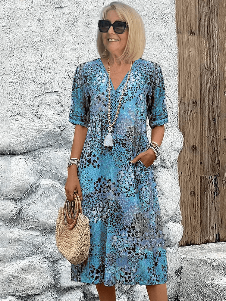 Skyler Ocean Breeze summer dress with a flowing silhouette, shown in vibrant colours