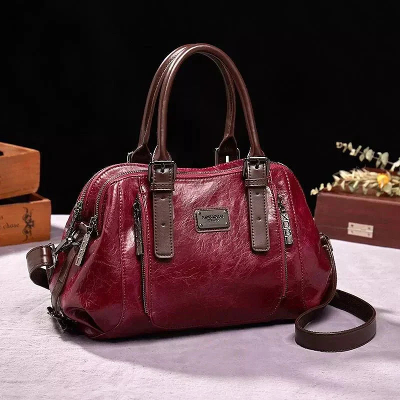 Willow signature statement handbag shown with structured silhouette and secure flap closure