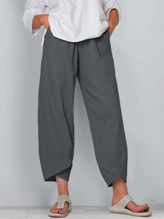 Avelina relaxed chic pants with a mid-rise waist and flowing silhouette, shown in neutral tones