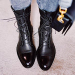 Andrea heeled boots shown in black and brown with a sleek modern silhouette