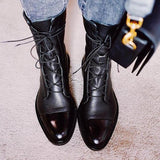 Andrea heeled boots shown in black and brown with a sleek modern silhouette
