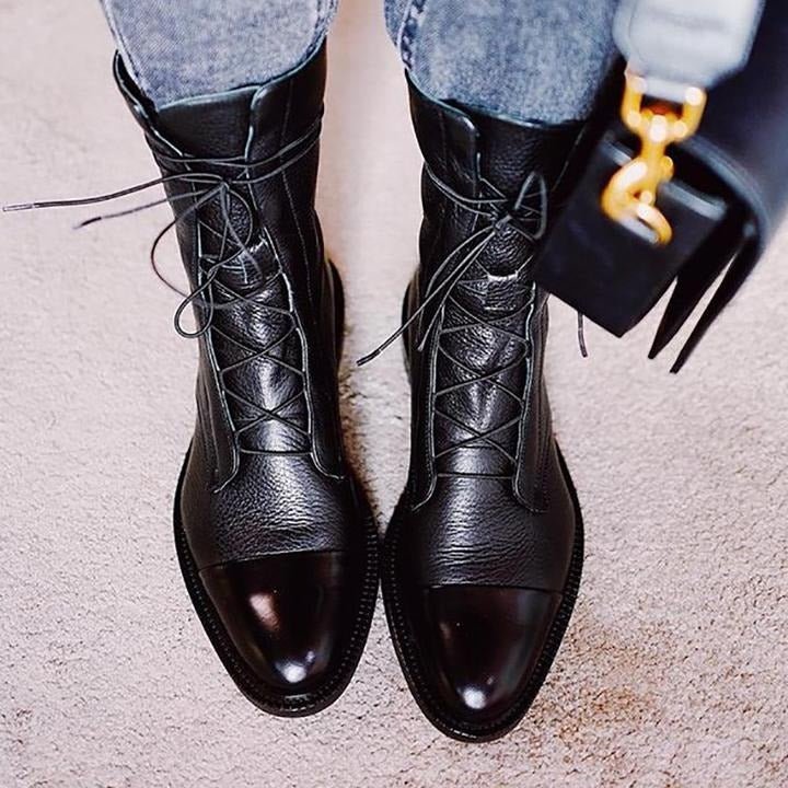Andrea heeled boots shown in black and brown with a sleek modern silhouette