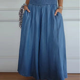 Sage flowy high-waist wide-leg pants shown in a relaxed, flattering silhouette