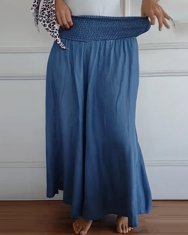 Sage flowy high-waist wide-leg pants shown in a relaxed, flattering silhouette