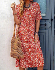 Lilo floral summer dress with mid-length cut and soft crew neckline