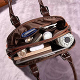 Willow signature statement handbag shown with structured silhouette and secure flap closure
