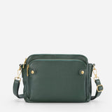 Kaya's Jewel full-grain leather shoulder bag shown in brown, blue, black and green