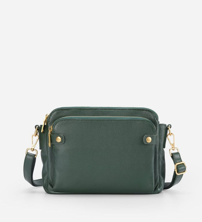 Kaya's Jewel full-grain leather shoulder bag shown in brown, blue, black and green