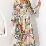 Daliah graceful floral dress with flowing silhouette in green and blue