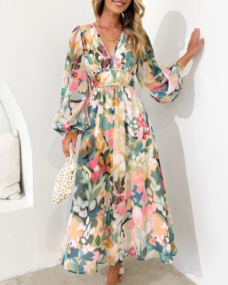 Daliah graceful floral dress with flowing silhouette in green and blue