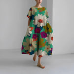 Celia floral Garden Goddess dress in a feminine print, shown in multiple colourways