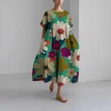 Celia floral Garden Goddess dress in a feminine print, shown in multiple colourways