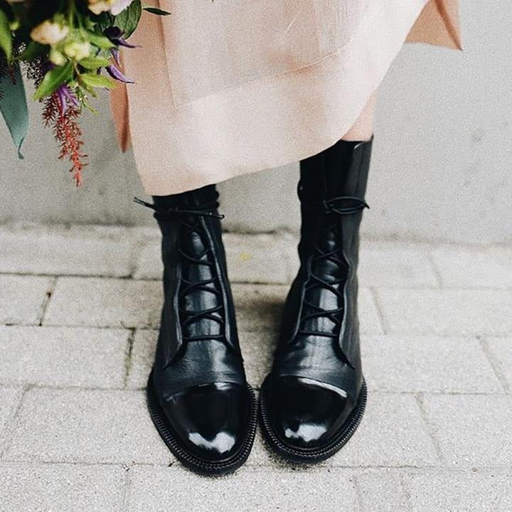 Andrea heeled boots shown in black and brown with a sleek modern silhouette