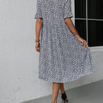 Anne elegant bloom midi dress in blue, red and green with a flattering feminine silhouette