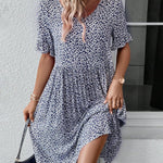 Anne elegant bloom midi dress in blue, red and green with a flattering feminine silhouette