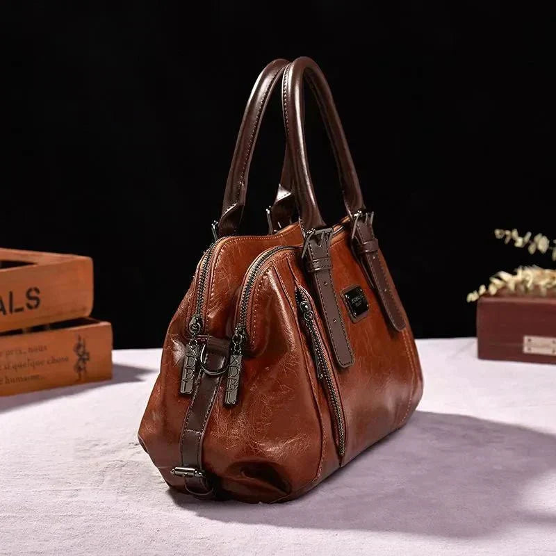 Willow signature statement handbag shown with structured silhouette and secure flap closure