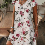 Amala Coastal Bloom floral mini dress with V-neckline and relaxed A-line silhouette