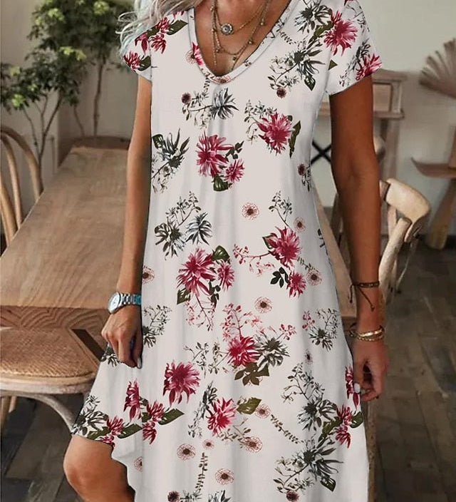 Amala Coastal Bloom floral mini dress with V-neckline and relaxed A-line silhouette