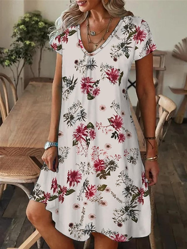 Amala Coastal Bloom floral mini dress with V-neckline and relaxed A-line silhouette