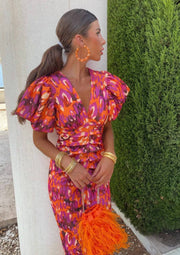 Giselle breezy floral midi dress with V-neckline and puff sleeves
