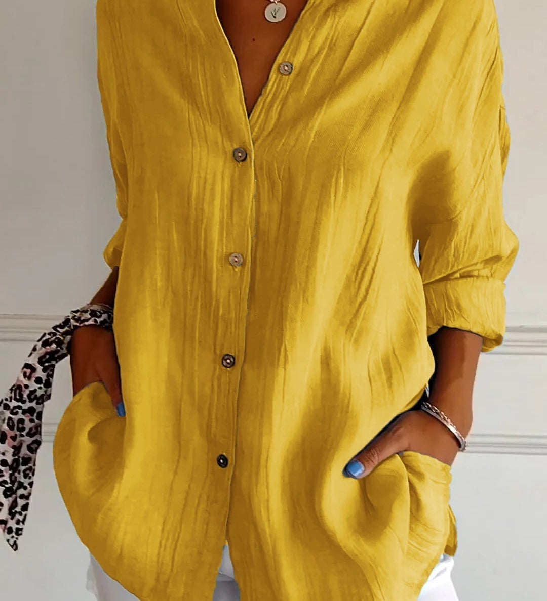 Ivy airy buttoned blouse with pleated neckline and soft flowing fit