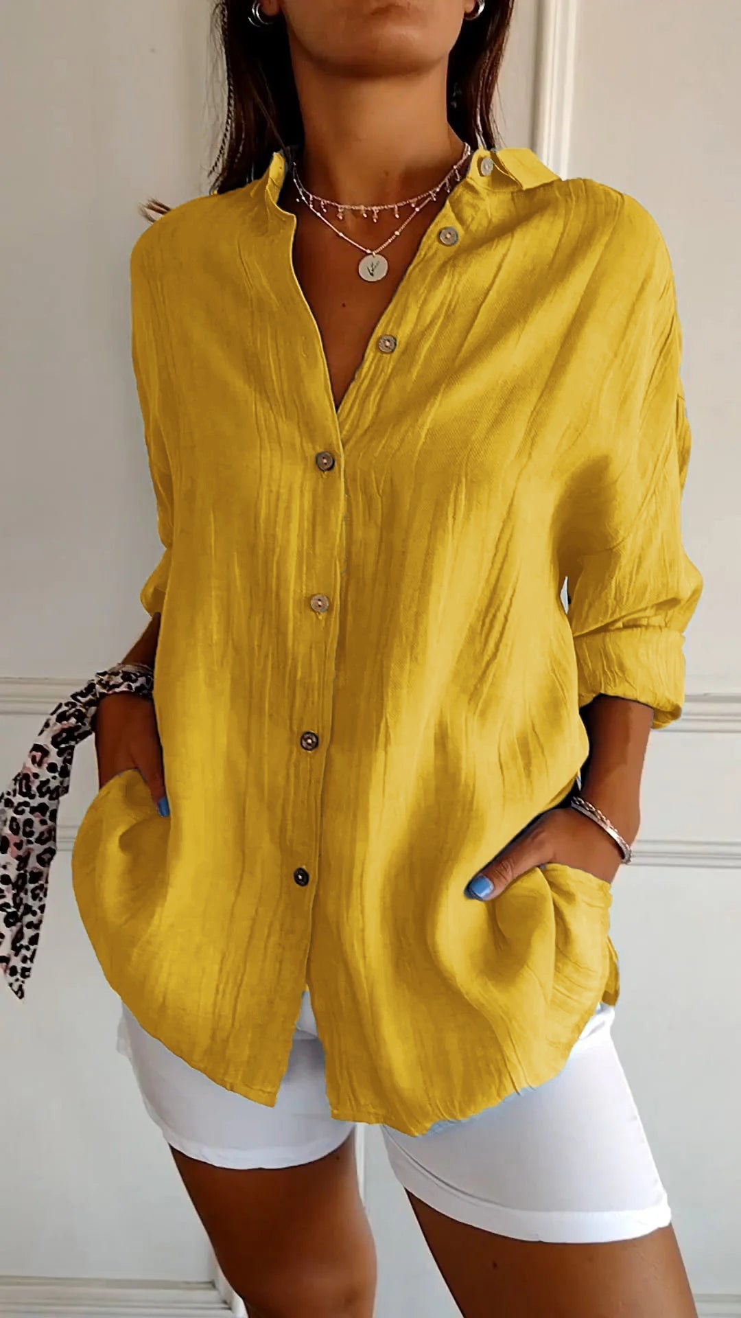 Ivy airy buttoned blouse with pleated neckline and soft flowing fit