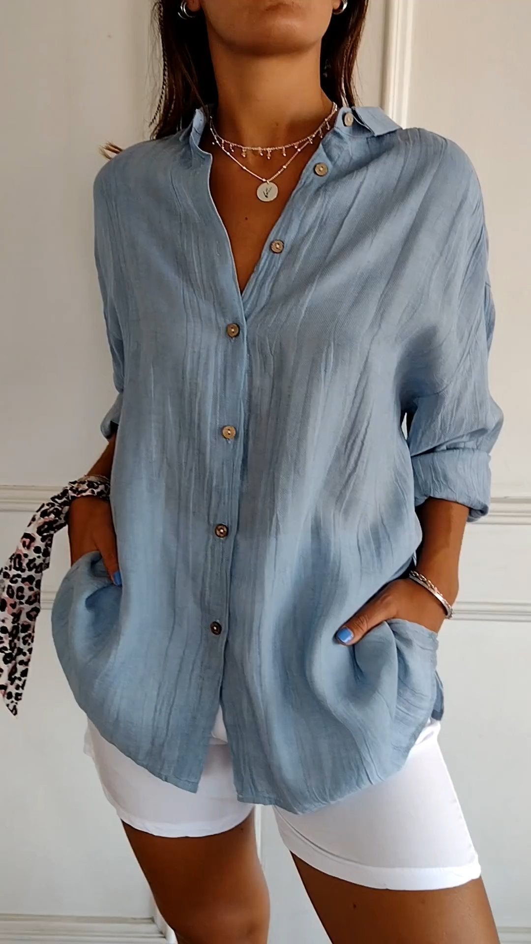 Ivy airy buttoned blouse with pleated neckline and soft flowing fit