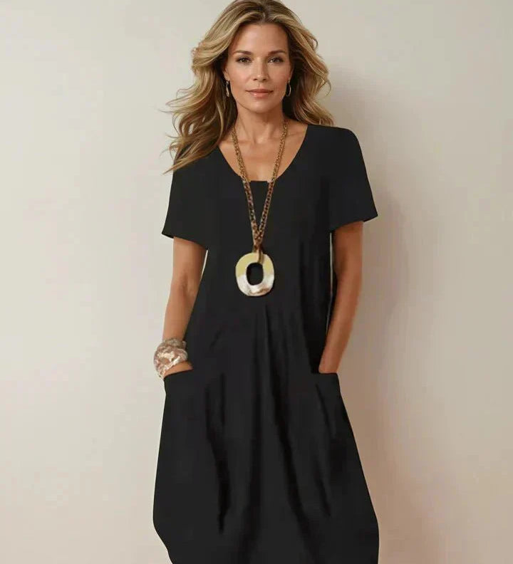 Kwani Easy Casual Flow Dress with round neck, classic sleeves and A-line silhouette