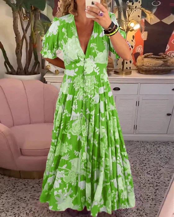 Izara flowy maxi dress with softly cinched elastic waist, shown in a relaxed feminine silhouette