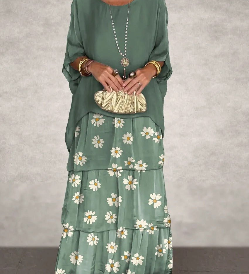 Kath graceful flowing maxi dress with a long, elegant silhouette, shown in multiple colours