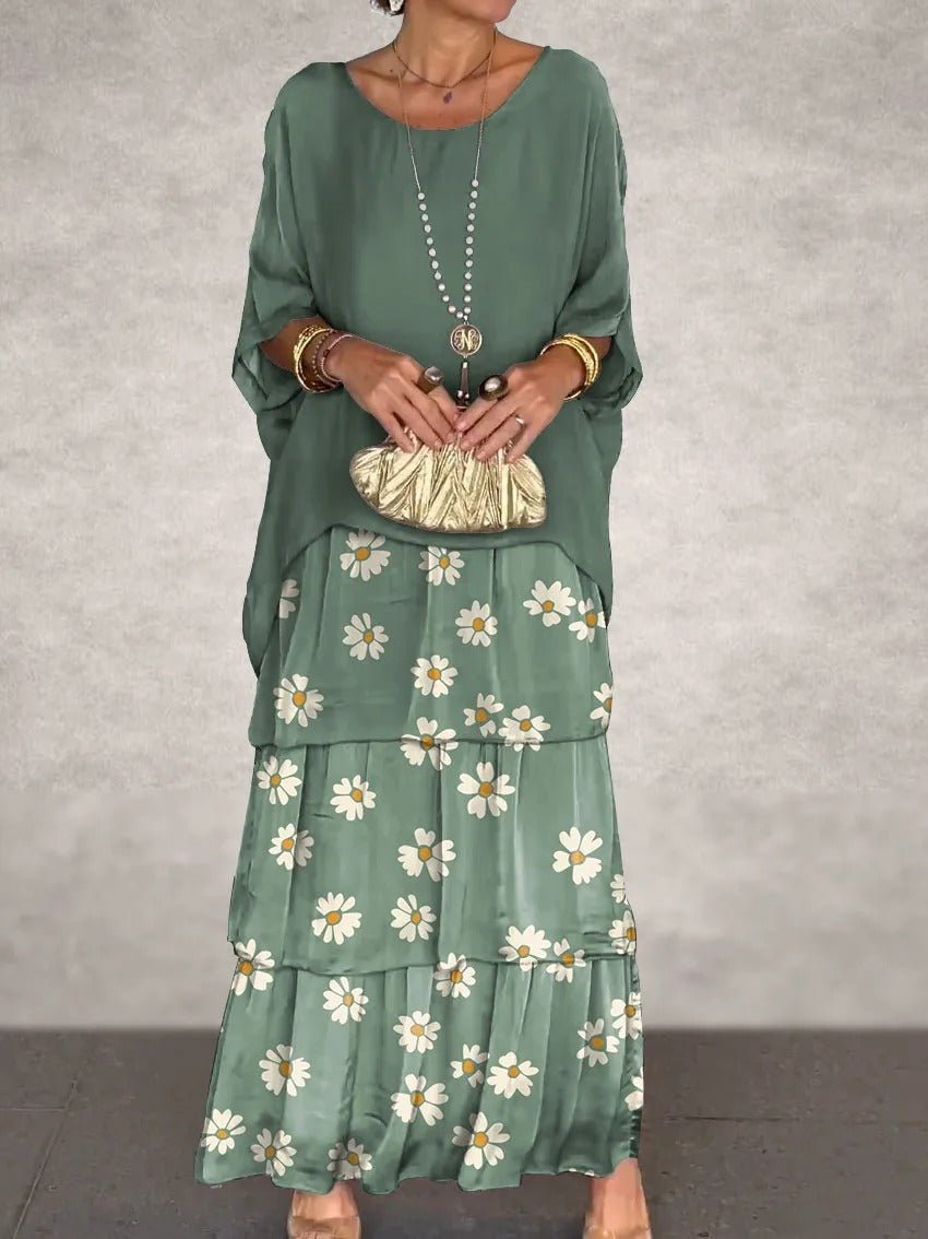 Kath graceful flowing maxi dress with a long, elegant silhouette, shown in multiple colours