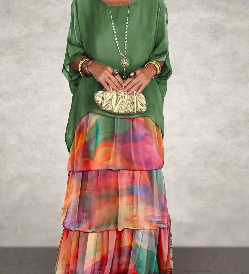 Kath graceful flowing maxi dress with a long, elegant silhouette, shown in multiple colours