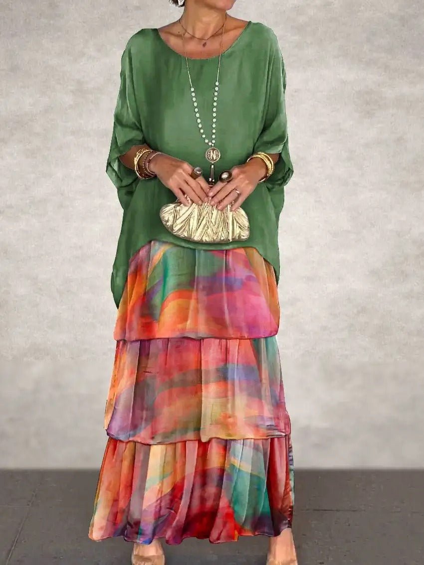 Kath graceful flowing maxi dress with a long, elegant silhouette, shown in multiple colours