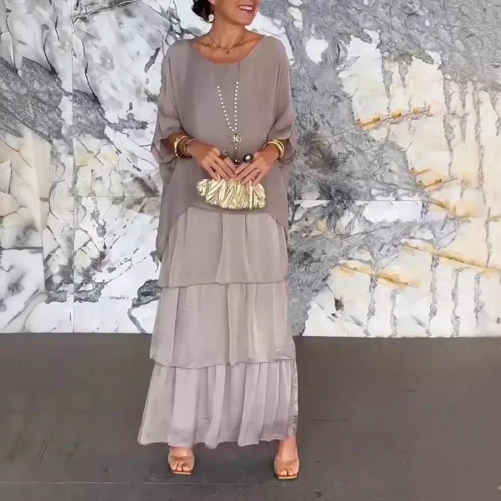 Kath graceful flowing maxi dress with a long, elegant silhouette, shown in multiple colours