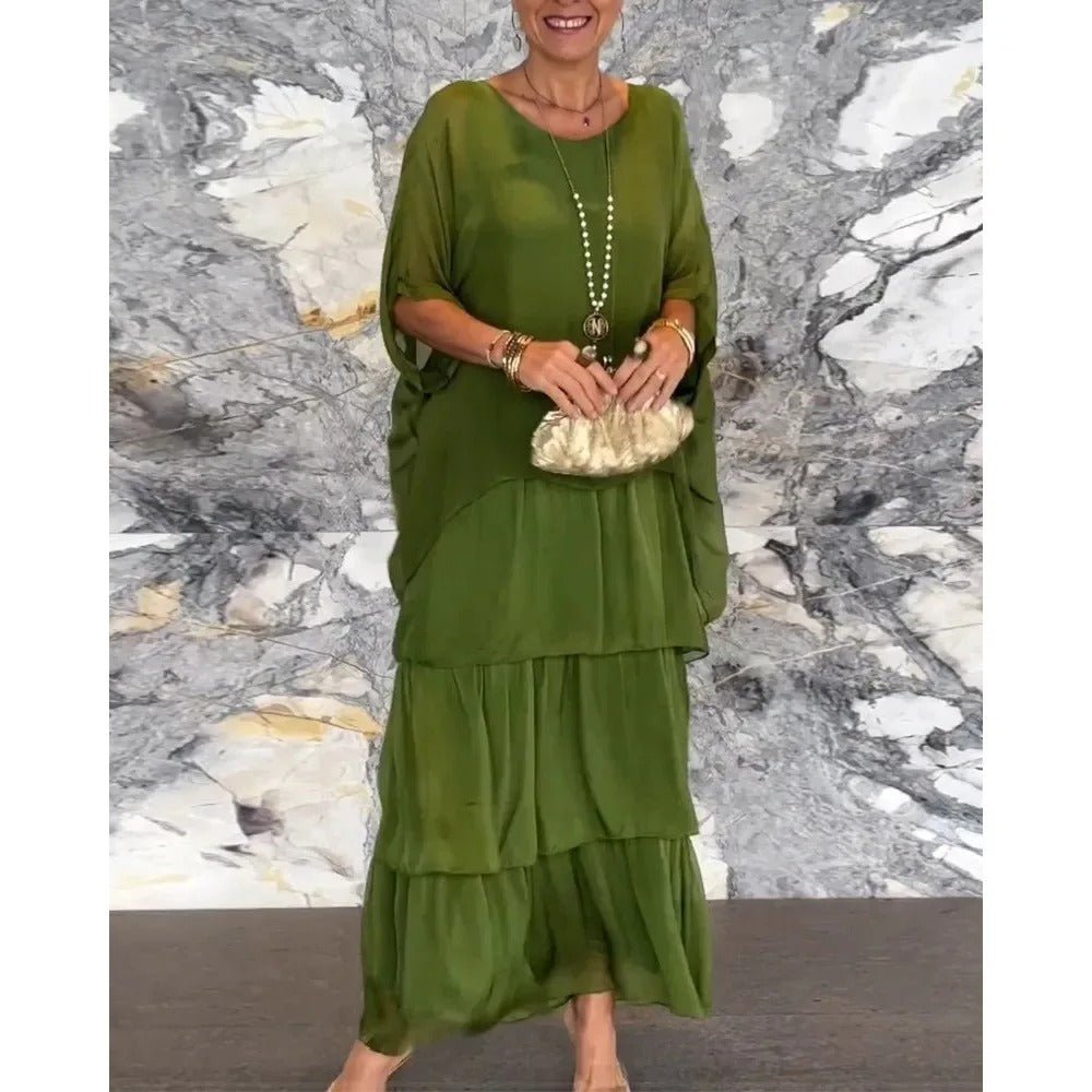 Kath graceful flowing maxi dress with a long, elegant silhouette, shown in multiple colours
