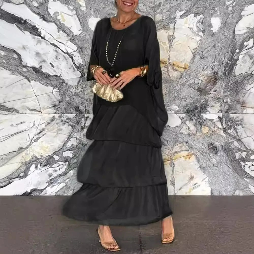 Kath graceful flowing maxi dress with a long, elegant silhouette, shown in multiple colours
