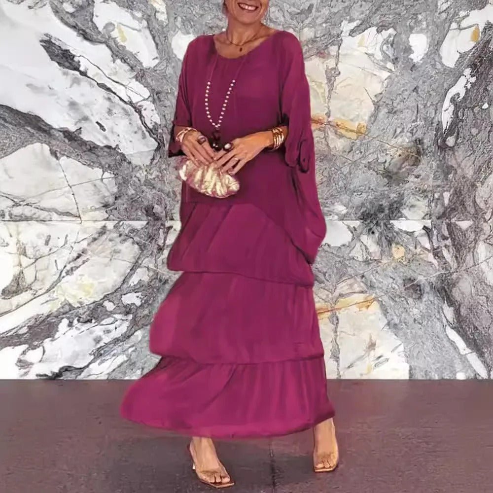 Kath graceful flowing maxi dress with a long, elegant silhouette, shown in multiple colours