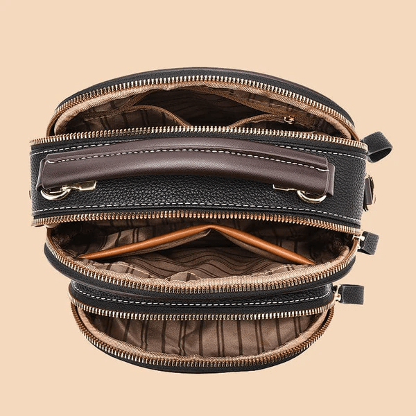 Maris timeless chic shoulder bag with adjustable strap, shown in a classic silhouette