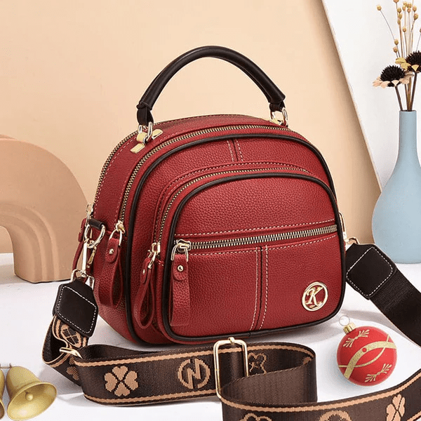 Maris timeless chic shoulder bag with adjustable strap, shown in a classic silhouette