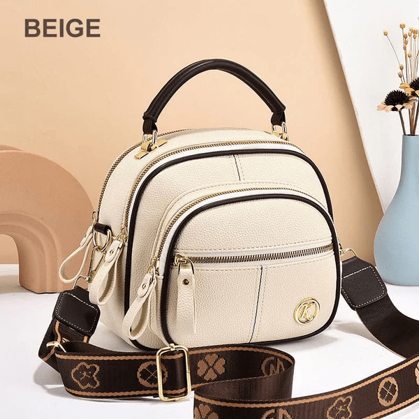 Maris timeless chic shoulder bag with adjustable strap, shown in a classic silhouette