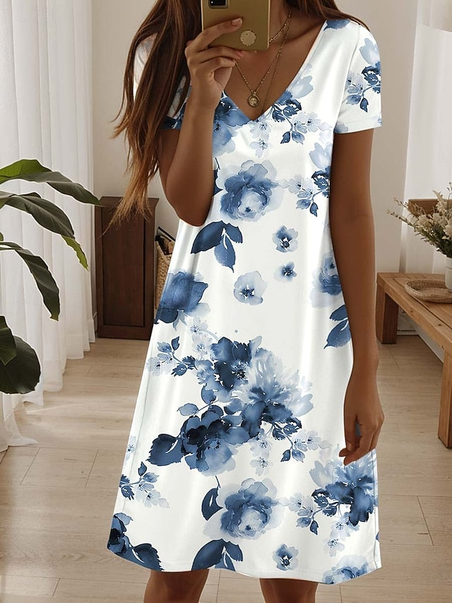 Amala Coastal Bloom floral mini dress with V-neckline and relaxed A-line silhouette