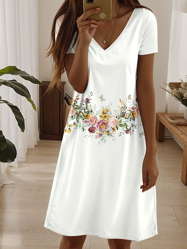 Amala Coastal Bloom floral mini dress with V-neckline and relaxed A-line silhouette