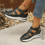 Isadora closed-toe sneaker sandals shown in carbon black and soft white