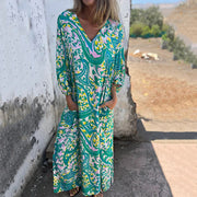 Hailey abstract print boho maxi dress with V-neckline and flowing silhouette