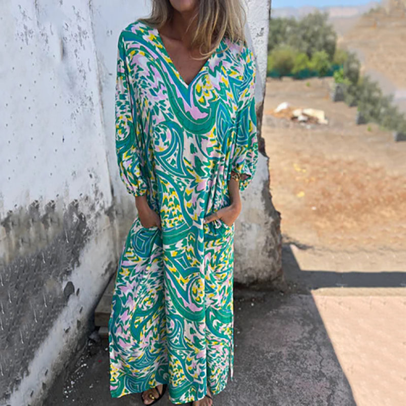 Hailey abstract print boho maxi dress with V-neckline and flowing silhouette
