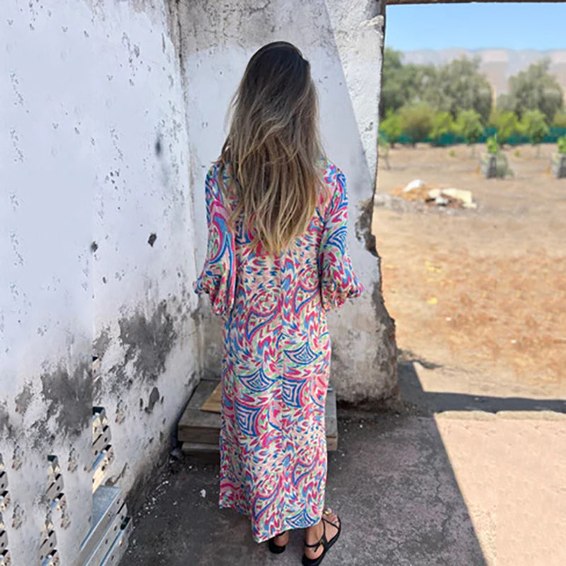Hailey abstract print boho maxi dress with V-neckline and flowing silhouette