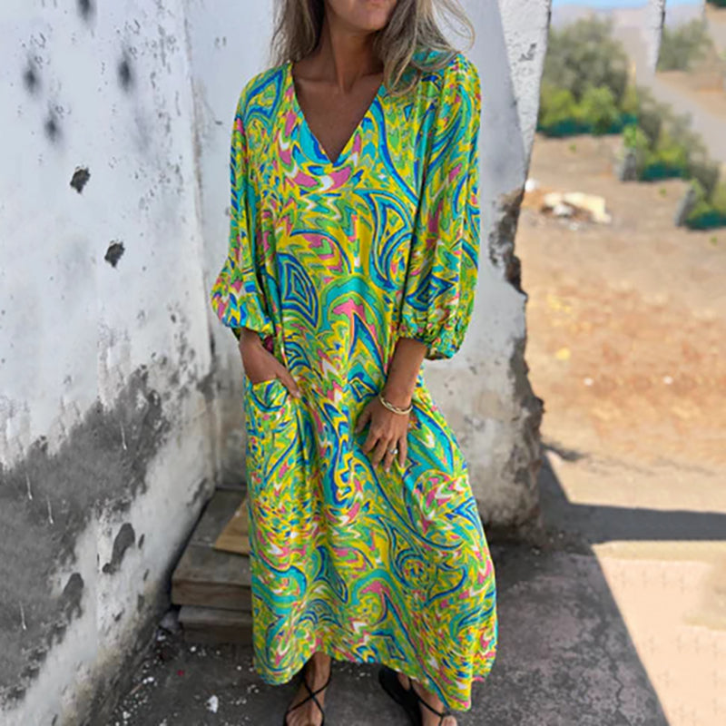 Hailey abstract print boho maxi dress with V-neckline and flowing silhouette