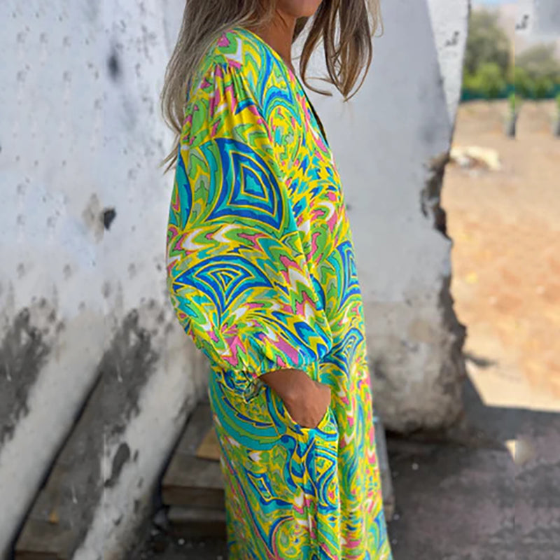 Hailey abstract print boho maxi dress with V-neckline and flowing silhouette
